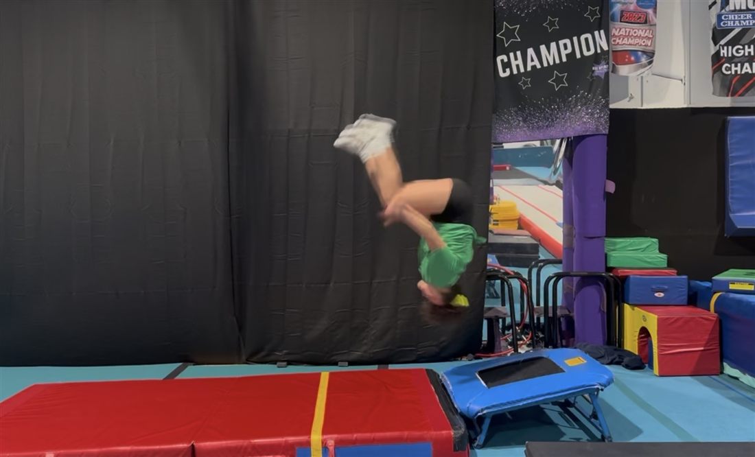 Athlete flipping off the springboard