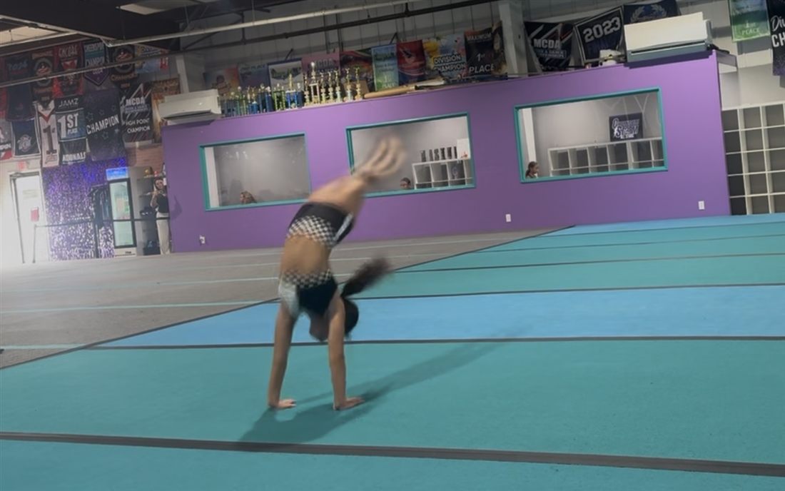 Athlete performing a back walkover